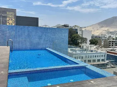 a swimming pool on the roof of a building at M15 - Two Bedroom Apartment in front of the US Embassy in Lima