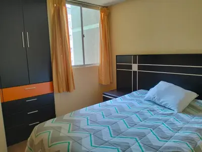 a bedroom with a bed and a window at Welcome to this apartment Pet friendly in Lima