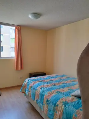 a bedroom with a bed and a window at Welcome to this apartment Pet friendly in Lima