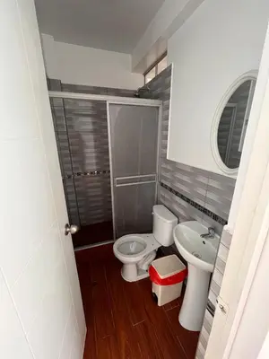a small bathroom with a toilet and a sink at Casa de playa con Piscina I-101 in Punta Negra