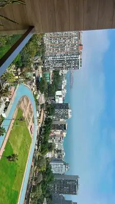 an overhead view of a city with a river and buildings at Barranco apartment facing the ocean in Lima