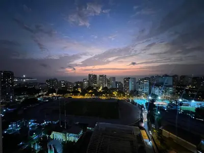 a view of a city at night with lights at Barranco apartment facing the ocean in Lima