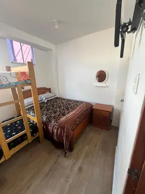 a bedroom with a bed and a bunk bed at Ministery The Bleasing in Lima