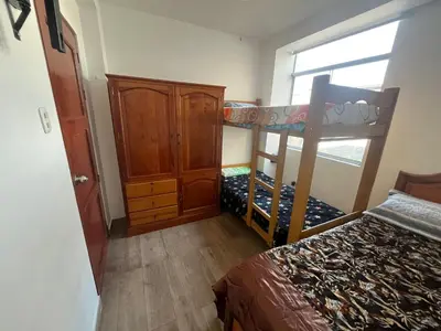 a bedroom with a bunk bed and a bunk bed at Ministery The Bleasing in Lima