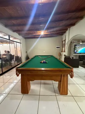 a pool table in a room with a ceiling at Casa de playa in Arica