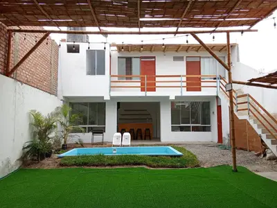 a house with a swimming pool in the yard at Excellent house in Quilmana in Quilmaná