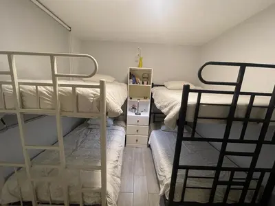 two bunk beds in a small room with two at Casa de Campo Quives Majestuoso 5BR in Santa Rosa de Quives