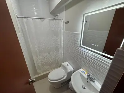 a small bathroom with a toilet and a sink at Apartment in San Bartolo - Playa Norte in San Bartolo