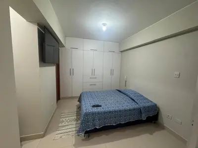 a bedroom with a bed and white cabinets at Apartment in San Bartolo - Playa Norte in San Bartolo