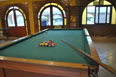 a pool table with balls on top of it at Bujama Campo Mar in Bujama Baja