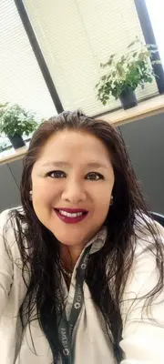 a woman wearing a white shirt and a tie at Cozy Room - Margot Arimborgo in Lima