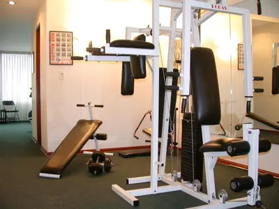 a room with a gym with some equipment in it at Hotel Boulevard in Lima