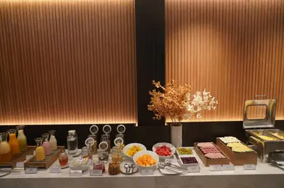 a buffet of food on a table in a room at Hotel Ferré Miraflores in Lima