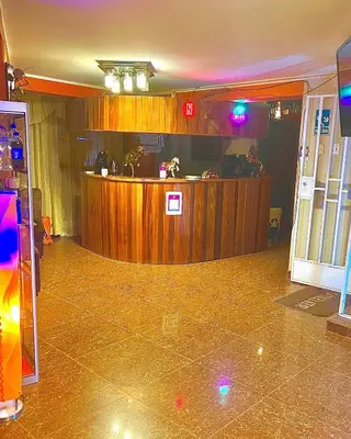 a room with a counter in the middle of a room at Hostal El Rancho in Huancayo