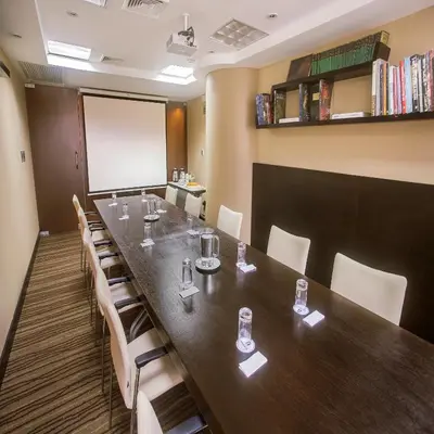 a conference room with a long table and chairs at Del Pilar Miraflores Hotel in Lima