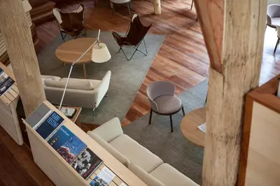 an overhead view of a living room with a couch and chairs at Explora Valle Sagrado in Urubamba