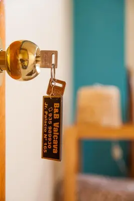 a key chain hanging from a door knob at B&B Valcava in Urubamba