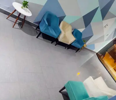 an overhead view of a room with chairs and a table at Regency Plaza Hotel in Pisco