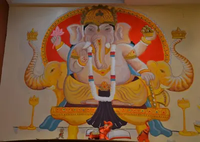 a painting of a god on a wall at Suspiros del Inka in Lima