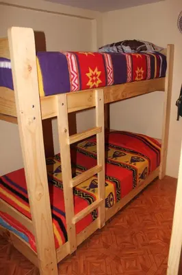 a pair of bunk beds in a room at Suspiros del Inka in Lima