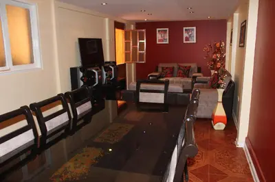 a view of a living room with a couch at Suspiros del Inka in Lima