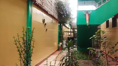 a building with a picture of a bulls head on the side at Hospedaje Del Pilar en Magdalena del Mar in Lima