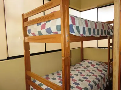 a bunk bedded room with a bunk bed in a house at Hospedaje Del Pilar en Magdalena del Mar in Lima