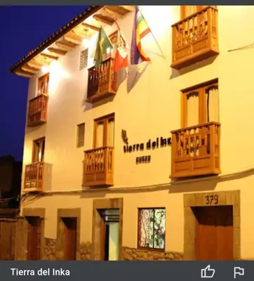 a building with balconies on the side of it at Tierra del Inka in Cusco