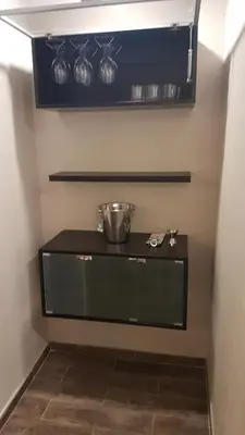 a room with a counter with a bowl on a shelf at Lima Flats 3 in Lima