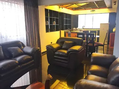a living room with two chairs and a couch at Del Niño Apartment, Best location in Cusco