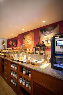 a restaurant with a counter with food on it at Centro by Casa Andina Miraflores in Lima