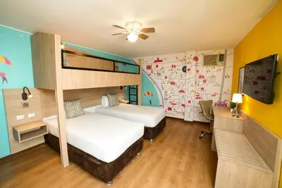 a bedroom with two bunk beds and a desk at Centro by Casa Andina Miraflores in Lima