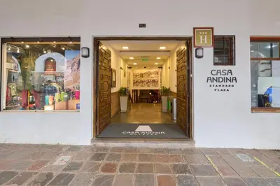 an entrance to a store with a sign in the door at Casa Andina Standard Cusco Plaza in Cusco