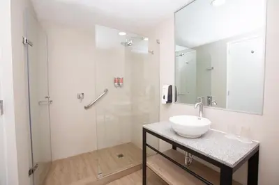a bathroom with a sink and a shower at Casa Andina Standard Cusco Plaza in Cusco
