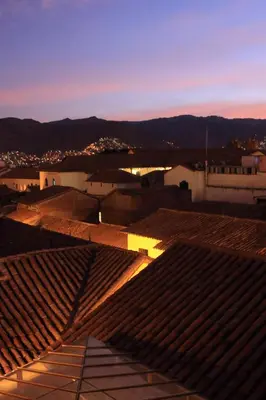 a view from the roof of a building at night at Hotel & Mirador Los Apus in Cusco