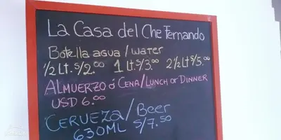 a chalkboard with a list of food on it at La Casa del Che Fernando in Lima