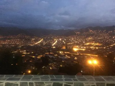 a view of a city at night with street lights at Wichana Wasi in Cusco