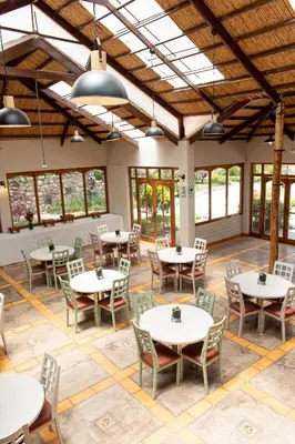 an empty dining room with tables and chairs at Tariq Sacred Valley in Urubamba