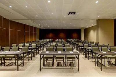 a conference room with tables and chairs in it at Hyatt Centric San Isidro Lima in Lima