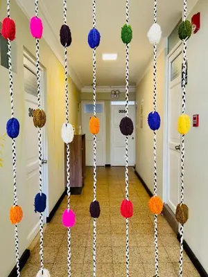 a hallway with colorful decorations on the walls at TATA Hotel Boutique in Cusco