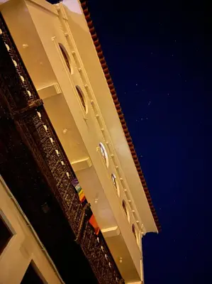 a view of the underside of a building at night at TATA Hotel Boutique in Cusco