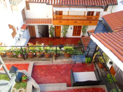 an overhead view of a house with a balcony at Quinua Boutique Apartments in Cusco