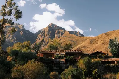 a house with a mountain in the background at Rio Sagrado, A Belmond Hotel, Sacred Valley in Urubamba
