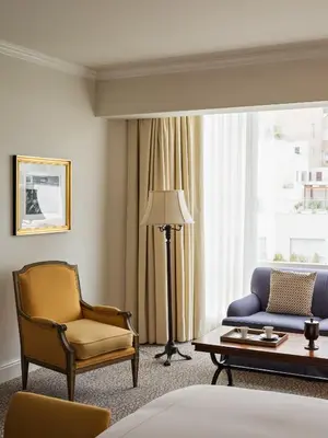 a living room with a couch and a chair at Miraflores Park, A Belmond Hotel, Lima in Lima