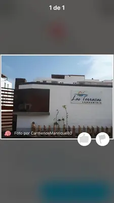 a picture of a building with a sign on it at Condominio Las Terrazas in Asia