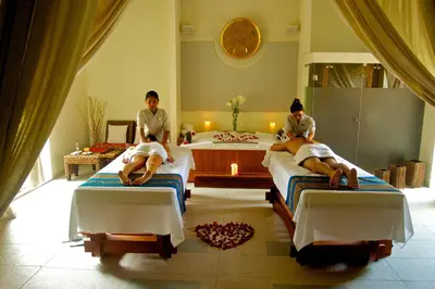 three people laying on beds in a room at Aranwa Sacred Valley Hotel & Wellness in Urubamba