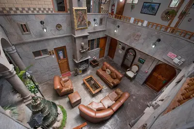 an overhead view of a living room with leather furniture at Ayenda Casa Escondida San Cristóbal Premium in Cusco