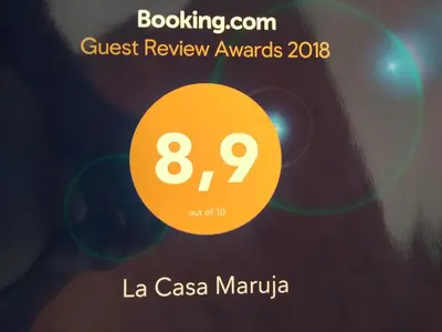 a poster for the quest review awards in la casa marija at La Casa Maruja in Lima