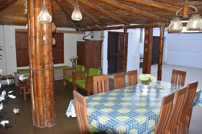 a dining room with a table and chairs at La Casa Maruja in Lima