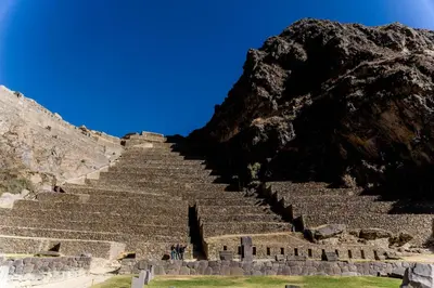 an amphitheater with stairs in front of a mountain at SAUCE Hotel Boutique in Ollantaytambo